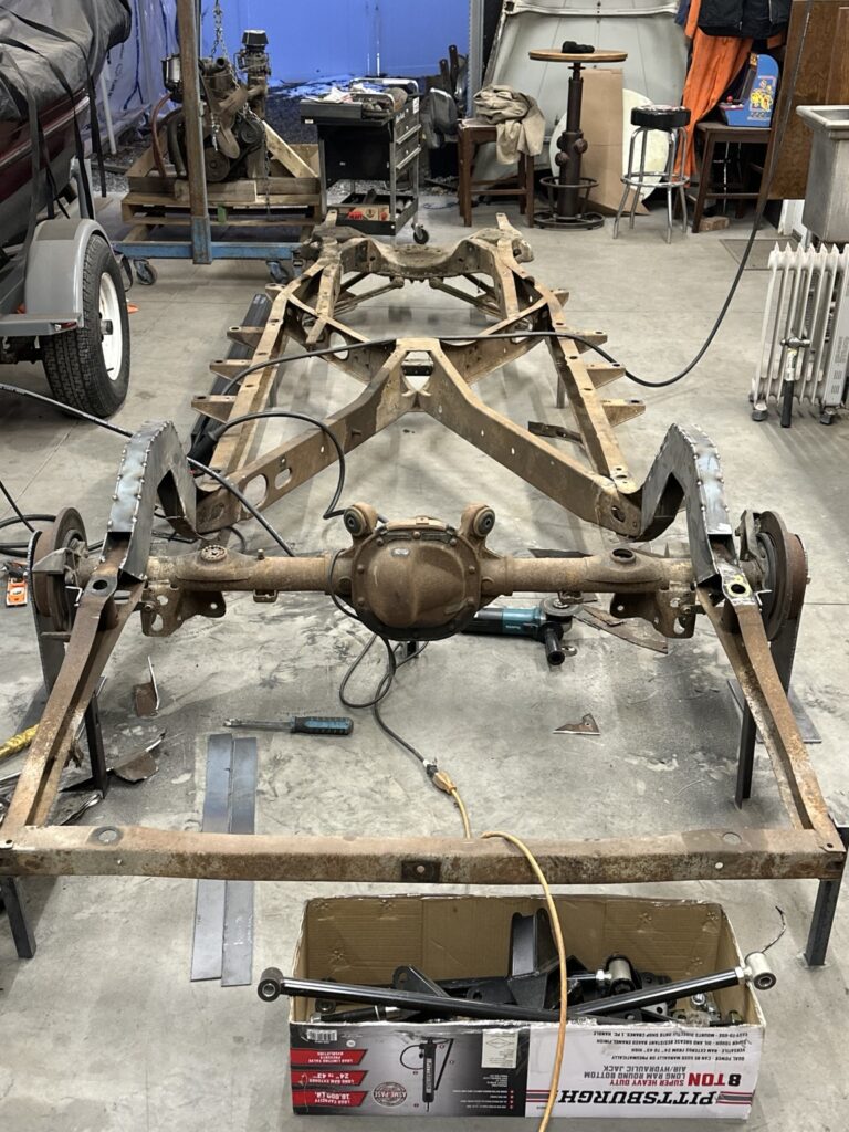 Rear axle and C-notch work in the context of the full frame.